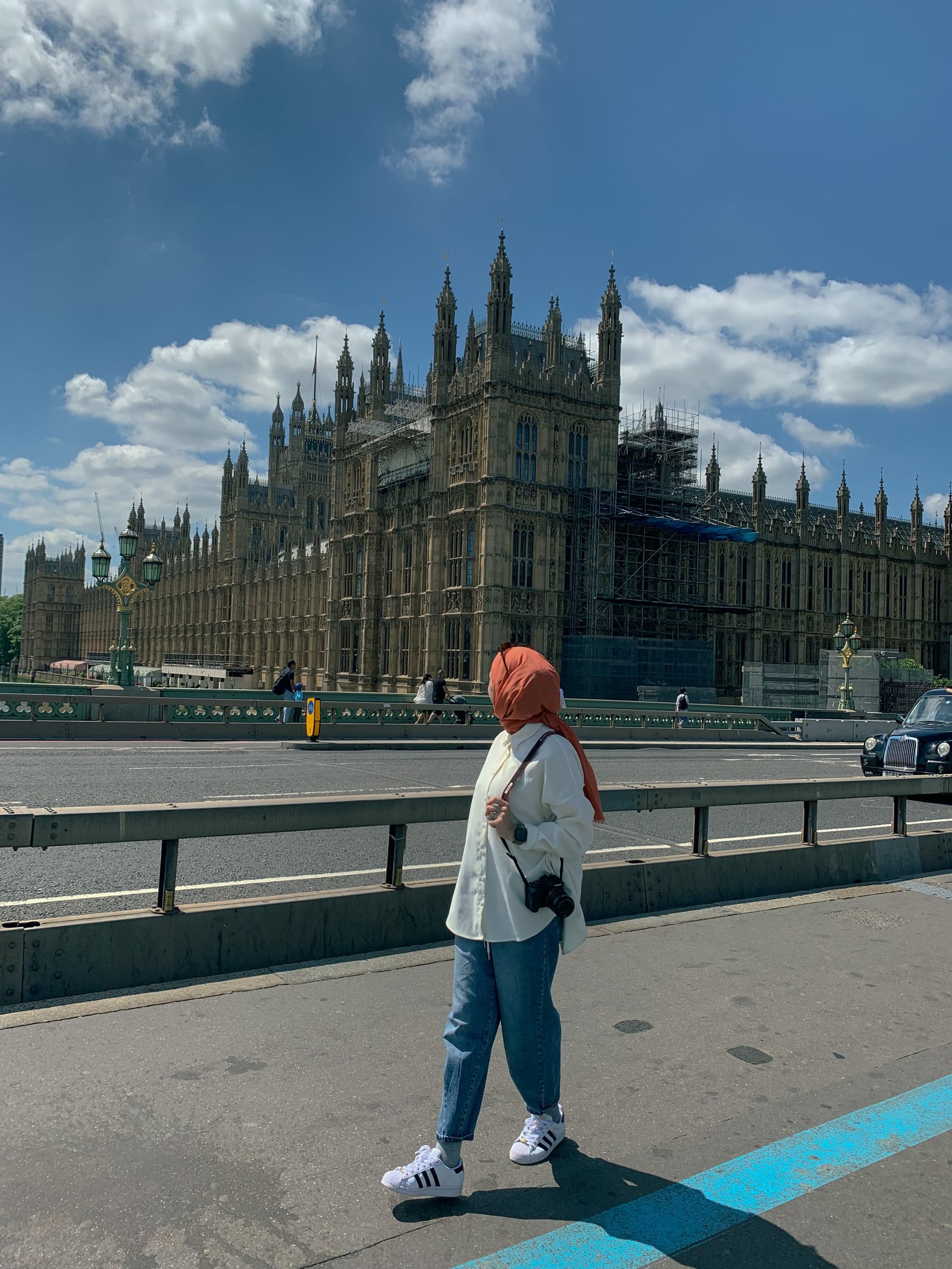 Female traveler exploring London near Big Ben